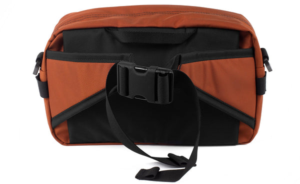 The LGD in Burnt Orange. Back view, showing the hide-away padded hip belt.